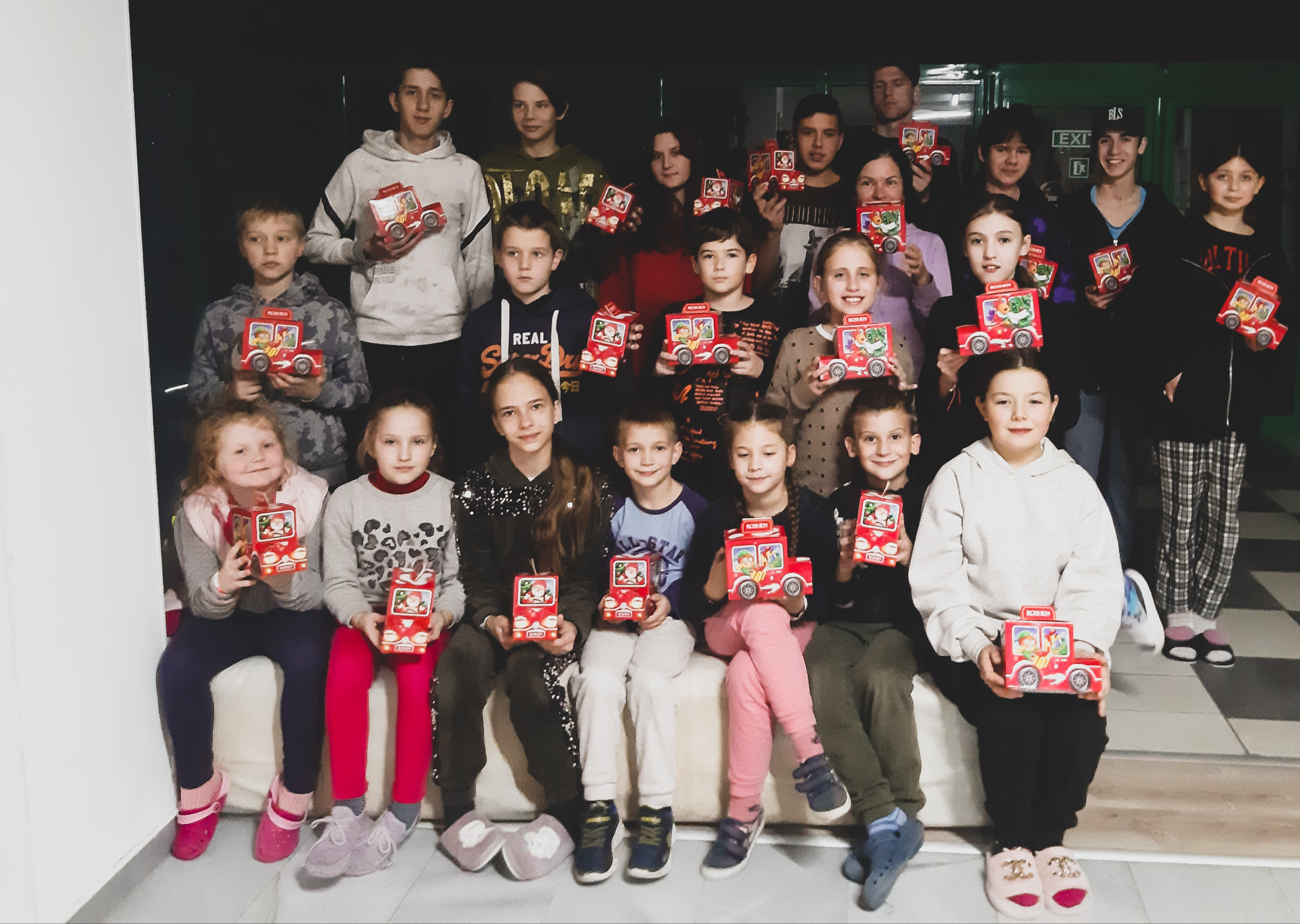 children from Ukraine with presents from IOM