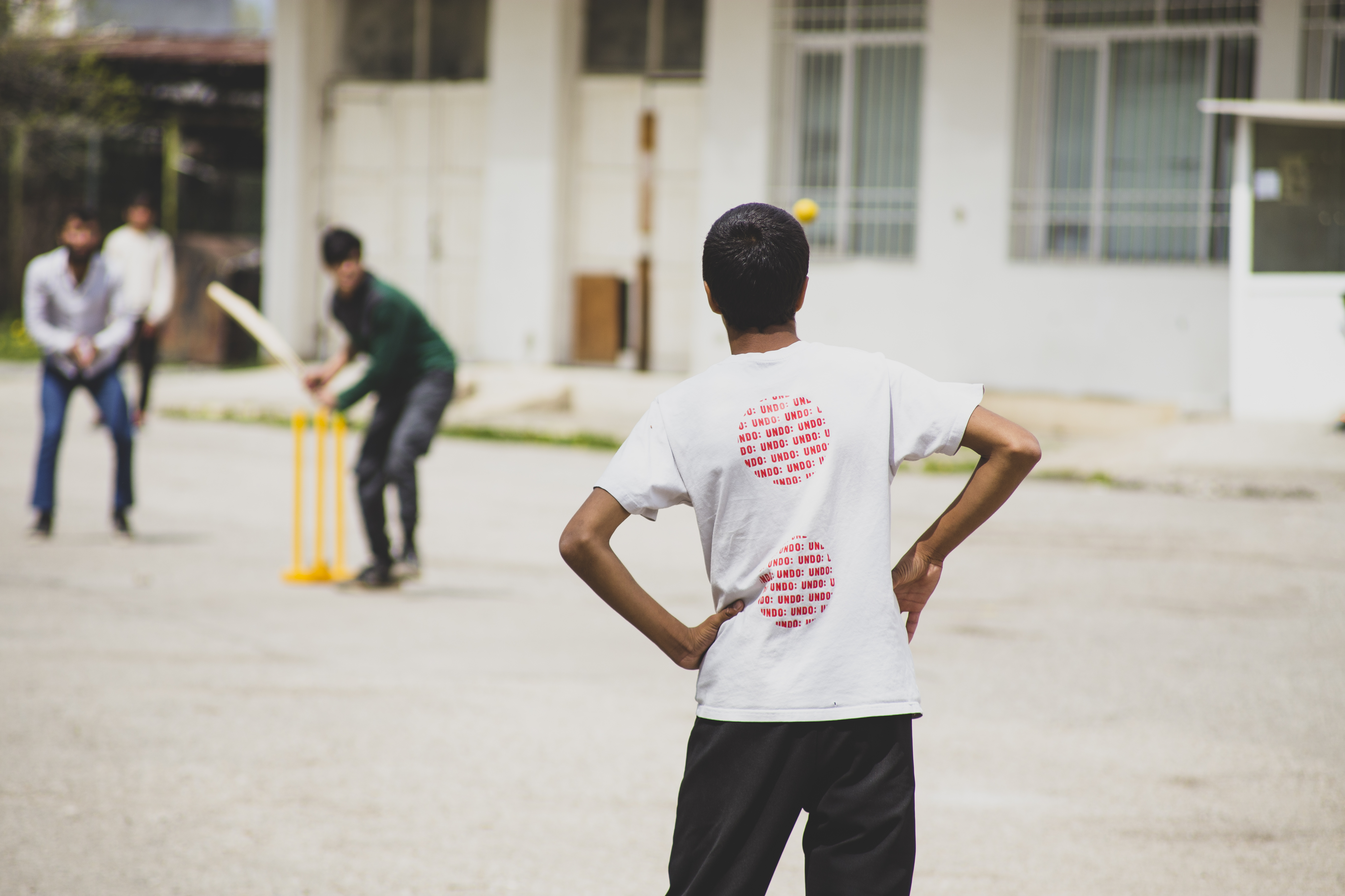 Unaccompanied minors during a game of cricket